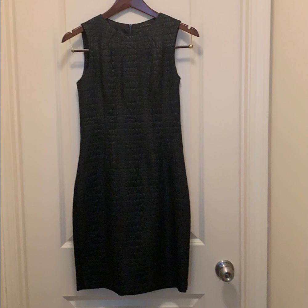 Black Elie Tahari lizard texture dress.